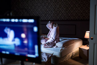penelope mitchell filming scene from apartment 212