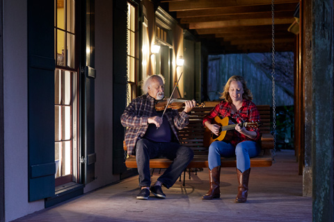 michael doucet and his wife sharon jam on their porch