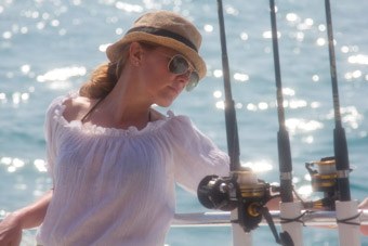 woman with fishing poles Florida Keys